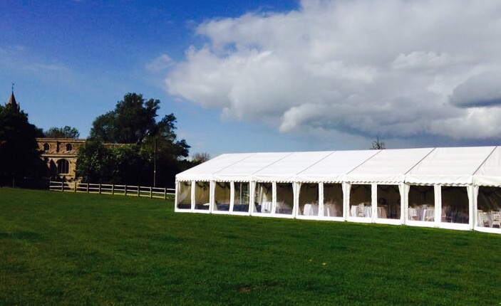 White marquee for an outdoor wedding