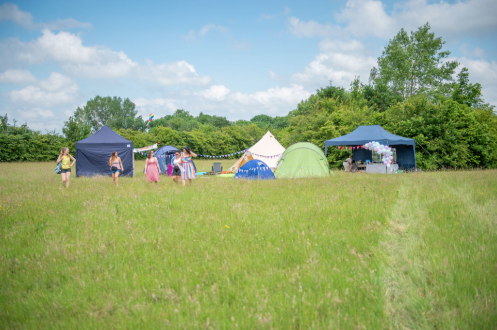 Private festival for a hen party weekend in a field.