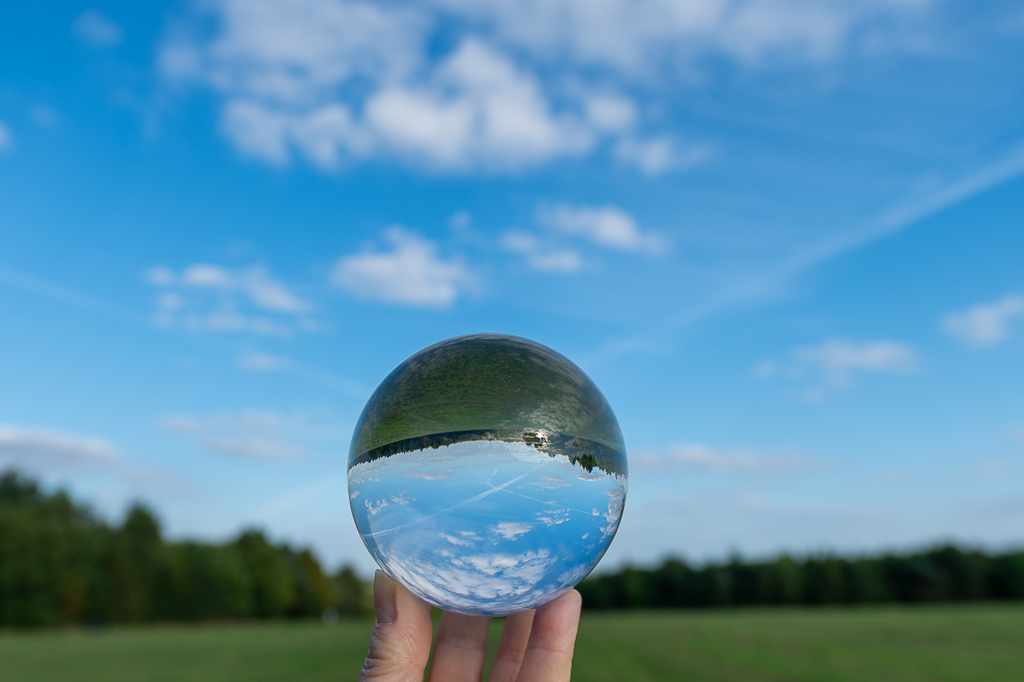crystal ball showing the grass and the sky