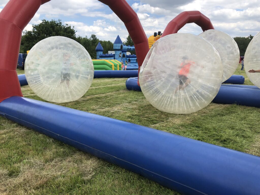 Zorbing at an outdoor event